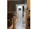 Unfinished hallway connecting the living room to other areas of the home at 7309 Royal Palm Dr, New Port Richey, FL 34652