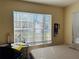 Bedroom with a desk and full-size bed at 7615 River Oak Run # 103, Lakewood Ranch, FL 34202