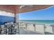 Enjoy breathtaking ocean views from this beautiful balcony with outdoor dining area at 1035 Seaside Dr # 503, Sarasota, FL 34242