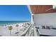 Wide angle balcony shot offering stunning ocean views, dining area, and comfortable lounge seating at 1035 Seaside Dr # 503, Sarasota, FL 34242