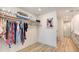 Spacious walk-in closet with custom shelving and storage solutions at 1035 Seaside Dr # 503, Sarasota, FL 34242