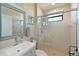 Small bathroom with shower and updated vanity at 12823 Penguin Dr, Bradenton, FL 34212