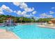 Community pool with water features and playground at 12823 Penguin Dr, Bradenton, FL 34212