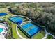 Two community pickleball courts with seating area at 12823 Penguin Dr, Bradenton, FL 34212