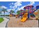 Playground by the lake with slides and playsets at 12823 Penguin Dr, Bradenton, FL 34212