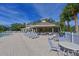 Resort-style pool with lounge chairs and cabana at 12823 Penguin Dr, Bradenton, FL 34212