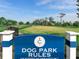 Spacious dog park area with green grass and play equipment for furry friends at 13922 Old Creek Ct, Parrish, FL 34219