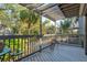 Outdoor deck featuring views of tropical foliage and the community at 1447 Landings Cir # 68, Sarasota, FL 34231