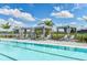 Striped cabanas provide shade near the pool at 17915 Palmiste Dr, Bradenton, FL 34202