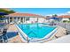 Community pool with chairs and tables for residents at 185 Vista Hermosa Circle, Sarasota, FL 34242