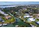 Bird's eye view of waterfront homes and waterways at 221 Lychee Rd, Nokomis, FL 34275