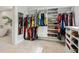 Large walk-in closet with ample shelving and hanging space at 221 Lychee Rd, Nokomis, FL 34275