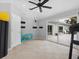 Bright home gym with pool access and exercise equipment at 221 Lychee Rd, Nokomis, FL 34275