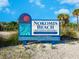 Nokomis Beach sign with information about the location and amenities at 221 Lychee Rd, Nokomis, FL 34275