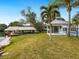 Two gazebos and lush lawn space overlooking the canal at 221 Lychee Rd, Nokomis, FL 34275