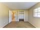 Bedroom featuring a closet and view to hall, complemented by neutral walls at 2211 42Nd W St, Bradenton, FL 34205