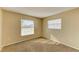 Bright, sunny bedroom with neutral walls, large windows, and plush carpet at 2211 42Nd W St, Bradenton, FL 34205