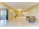 Spacious living room featuring neutral paint colors and tile flooring at 2211 42Nd W St, Bradenton, FL 34205