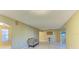 Bright living room with tiled floors and neutral paint at 2211 42Nd W St, Bradenton, FL 34205