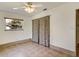 Bright bedroom with tile floors and ceiling fan at 2822 Maple Ave, Sarasota, FL 34234