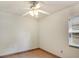 Simple bedroom with tile floors and window at 2822 Maple Ave, Sarasota, FL 34234