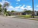 Front view of the house with a yard at 2822 Maple Ave, Sarasota, FL 34234