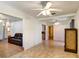 Bright living room with tile floors and ceiling fan at 2822 Maple Ave, Sarasota, FL 34234