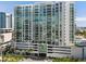 Luxury high rise condo building features modern architecture, balconies, and stunning city views at 301 Quay Commons # 1809, Sarasota, FL 34236