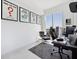 Modern office area with desk, modern chair, and cityscape views at 301 Quay Commons # 1809, Sarasota, FL 34236