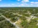 Aerial view of house nestled in a quiet neighborhood setting at 3273 Wentworth St, North Port, FL 34288