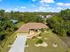 Aerial view of a single Gathering home and yard at 3273 Wentworth St, North Port, FL 34288