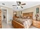 Spacious bedroom with wood furniture and tile floors at 3273 Wentworth St, North Port, FL 34288