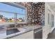 Modern kitchen sink area features stylish backsplash, updated faucet, and granite countertops at 3446 Monica Pkwy, Sarasota, FL 34235