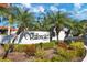 Valencia community entrance with lush landscaping at 3500 El Conquistador Pkwy # 252, Bradenton, FL 34210