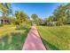 Inviting walkway leading to community pool area at 3500 El Conquistador Pkwy # 252, Bradenton, FL 34210