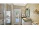 Poolside bathroom offering easy access to the outdoor pool and shower at 3628 Fair Oaks Pl, Longboat Key, FL 34228