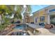 Relaxing backyard oasis features a private pool, patio, and an inviting outdoor living space at 3628 Fair Oaks Pl, Longboat Key, FL 34228