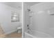 Bathroom with shower, toilet, and tile flooring at 3711 20Th E St, Bradenton, FL 34208