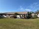 Lawn and garden view of rear exterior at 3739 Collins St # 701, Sarasota, FL 34232