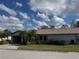 Charming single story home with attached carport, manicured lawn and mature landscaping at 3739 Collins St # 701, Sarasota, FL 34232