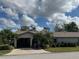 Charming single story home with attached carport, manicured lawn and mature landscaping at 3739 Collins St # 701, Sarasota, FL 34232