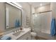 Bathroom with a single sink vanity, framed mirror, and tub and shower combo at 3860 Santa Caterina Blvd, Bradenton, FL 34211