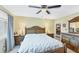 Spacious main bedroom with a king-size bed and large windows at 3990 Overlook Bnd # 19, Sarasota, FL 34232