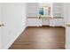 Bedroom with built-in shelving and desk area offering a functional and organized space for work or study at 4244 Reflections Pkwy, Sarasota, FL 34233