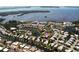 An aerial view shows the desirable waterfront community with canals, ponds and easy access to the Bay at 4722 Independence Dr, Bradenton, FL 34210