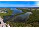 Breathtaking aerial view of the coastline, islands, and a clear blue ocean at 4722 Independence Dr, Bradenton, FL 34210