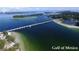 Aerial view of a bridge and coastal waterways, showcasing the surrounding landscape at 4722 Independence Dr, Bradenton, FL 34210