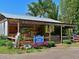 Charming farm market with colorful flowers and fresh produce on display at 4722 Independence Dr, Bradenton, FL 34210