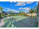 Shuffleboard courts surrounded by lush landscaping is a great place for outdoor fun and relaxation at 4722 Independence Dr, Bradenton, FL 34210