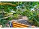 Scenic walking path surrounded by lush greenery and landscaping at 4722 Independence Dr, Bradenton, FL 34210